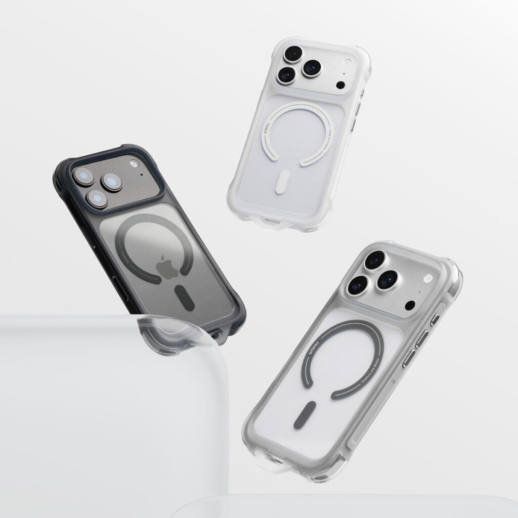 宙に浮かぶbitplay・Wander Case with エアバッグ3色。四隅のエアバッグ構造とMagSafeリングを備えた、半透明のブラック・グレー・ホワイトのiPhoneケース
